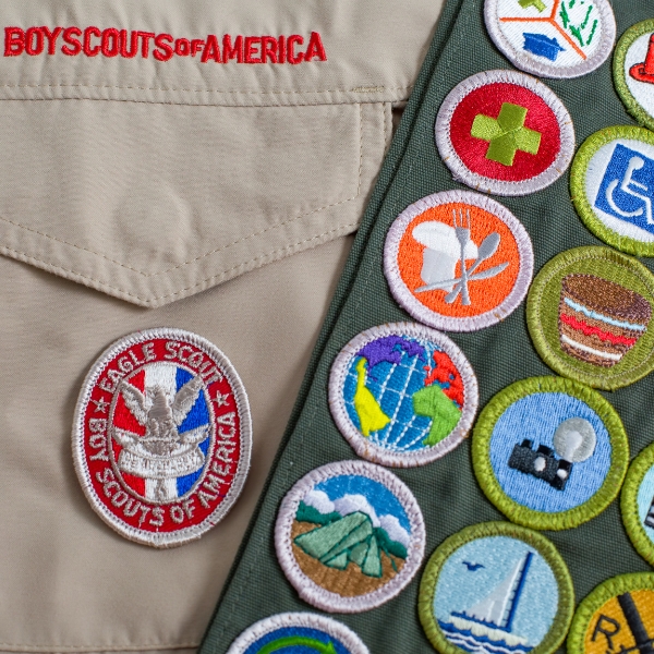 Close up of eagle scout patch on boy scout uniform